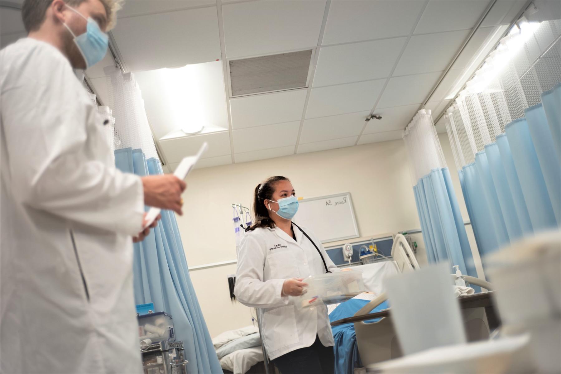 Students working in nursing lab