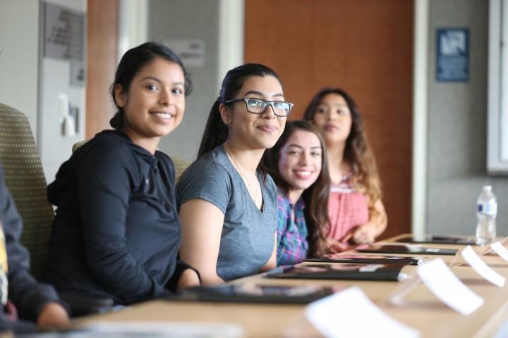 Students posing in classroom. 